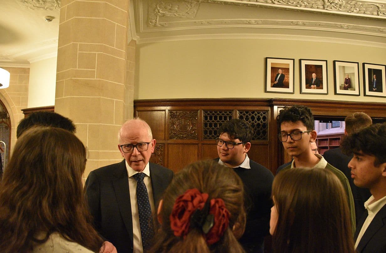 Lord Reed chats to law students after the event