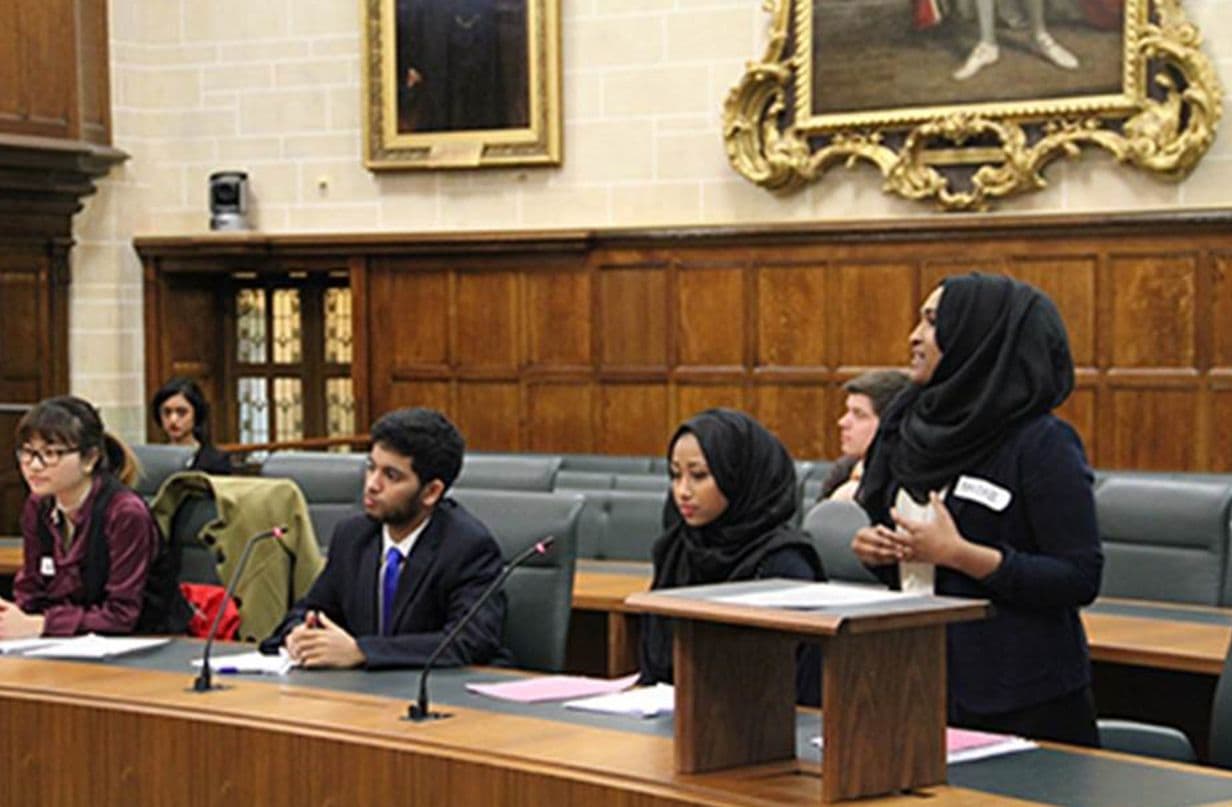Students debating in the JCPC